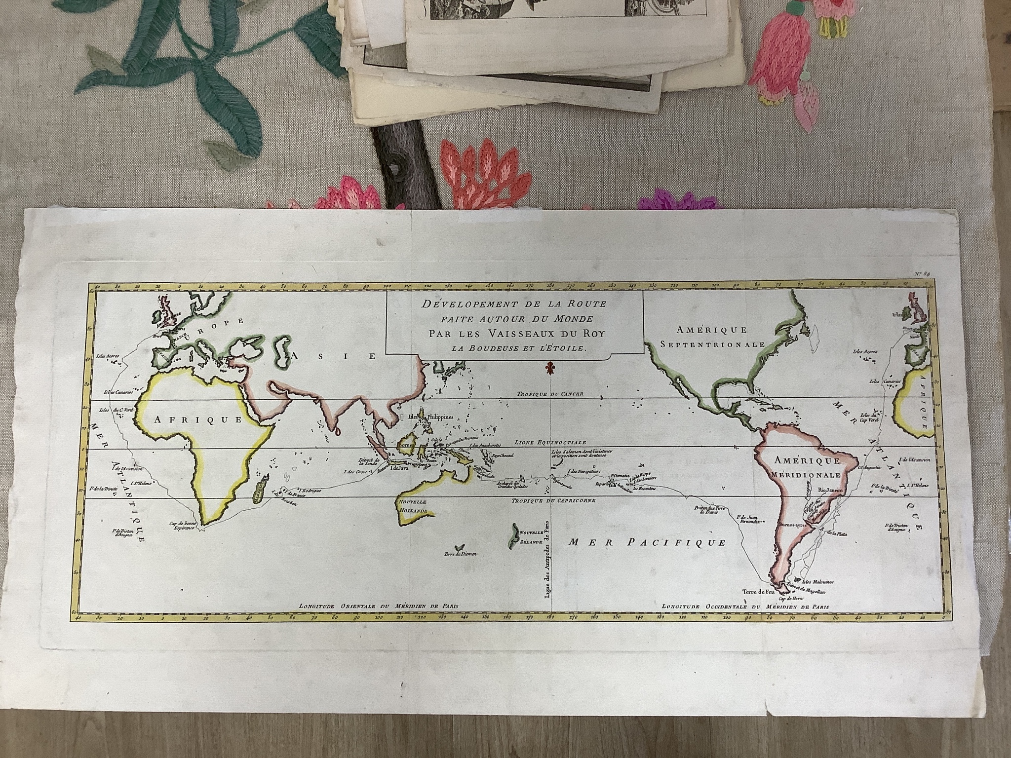 A folio of 18th/19th century maps and scientific engravings, including an engraving after Ludovico Lanberti, a map of the World plotting Bourgainvilles voyage of 1772